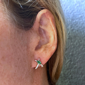 gold cross earrings with diamonds and emeralds jardin de aire