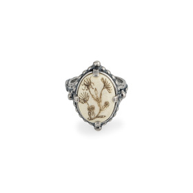 Silver ring with engraved bone