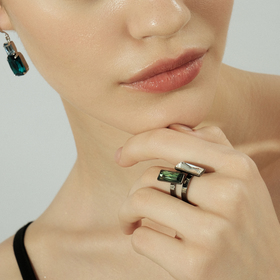 Blackened ring with emerald crystal