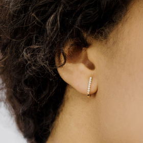 Gold J earring