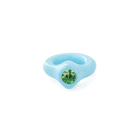 blue polymer clay ring with green crystal