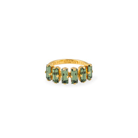 A ring with green crystals and Be Brave engraving. Green