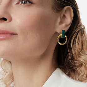 Gold-tone round earrings with green stone