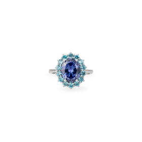 Silver ring with a large blue crystal