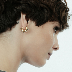 Gold-tone single earring with spikes