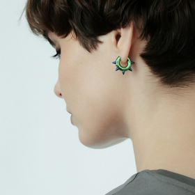 Green single earring with spikes