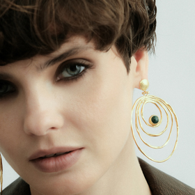 Gold-plated earrings with rings and green stones