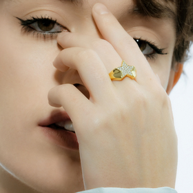 Gold-plated ring with a star of white crystals