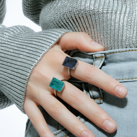 Silver ring with a large blue-green rectangular crystal