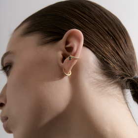 Gold-plated hoop earrings with a path of multicolored crystals
