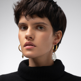 gold-plated silver asymmetric earrings with a pearl and a bug