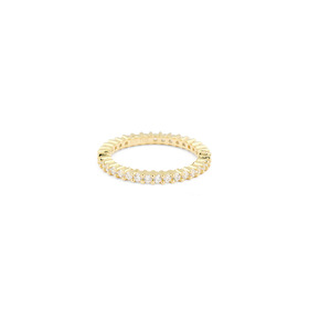 A thin gold-plated ring made of white crystals