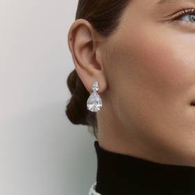 Silver earrings with white zirconium drop pendants