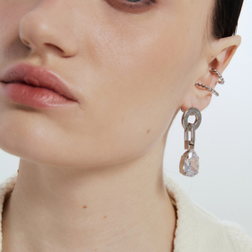 earrings with a large drop of zirconium