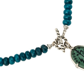 Necklace made of blue jade with a pendant made of hrutsal and a tiger stone