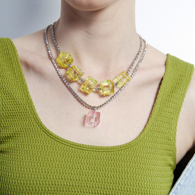 Necklace with pink cube and crystals