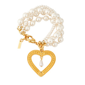 Multi-layered pearl bracelet with a golden heart pendant