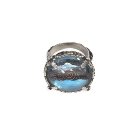 Silver ring with carved blue crystal and fish pattern
