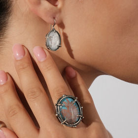 Vintage-style silver earrings with engraved glass intaglio