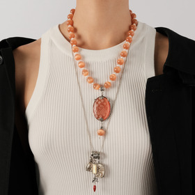 Necklace-chain made of silver with pendants made of mother of pearl, coral, bone