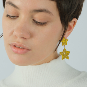 Yellow star earrings with crystals