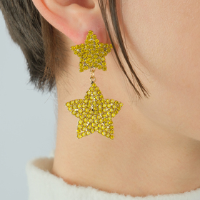 Yellow star earrings with crystals
