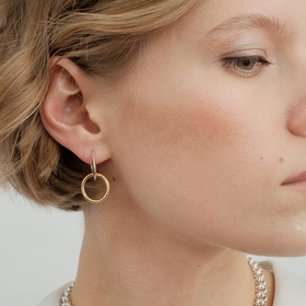 silver hoop mono earring with a gilded circle