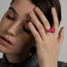 bright pink polymer clay ring with green crystal
