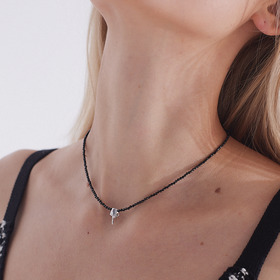 Black necklace with a silver hand pendant SHADOW SIDE