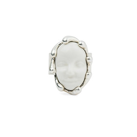 silver plated ring with a face-shaped white porcelain cabochon