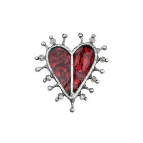Brooch in the shape of a red heart