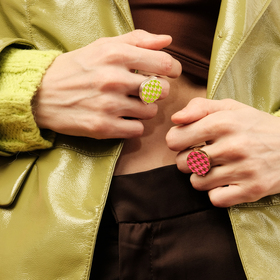 gold-plated double-sided ring-earring transformer with a neon enamel houndstooth pattern