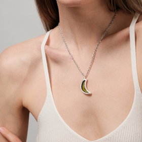 necklace with a yellow moon pendant