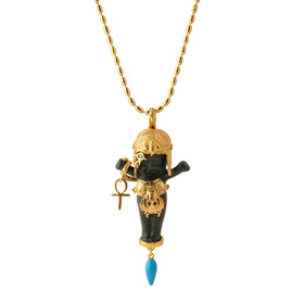 black porcelain cleo baby doll on a gold-plated chain