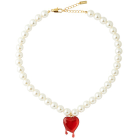 Necklace made of white beads with a heart pendant