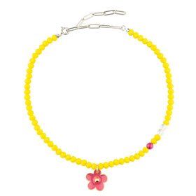 yellow bead necklace with a pink flower