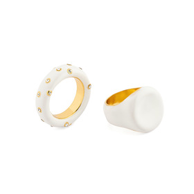 A pair of rings with white enamel