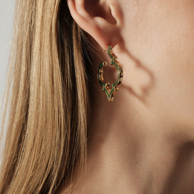 Curved earrings with green enamel