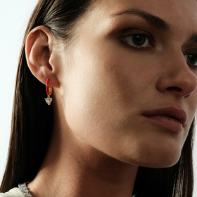 gold-tone enamel earrings with a heart pendant