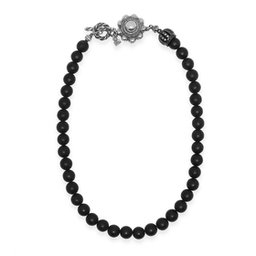 Silver necklace made of onyx beads with a crown pendant with a pavé of their crystals