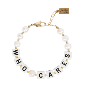 Pearl bracelet with ceramic letters "Who cares"
