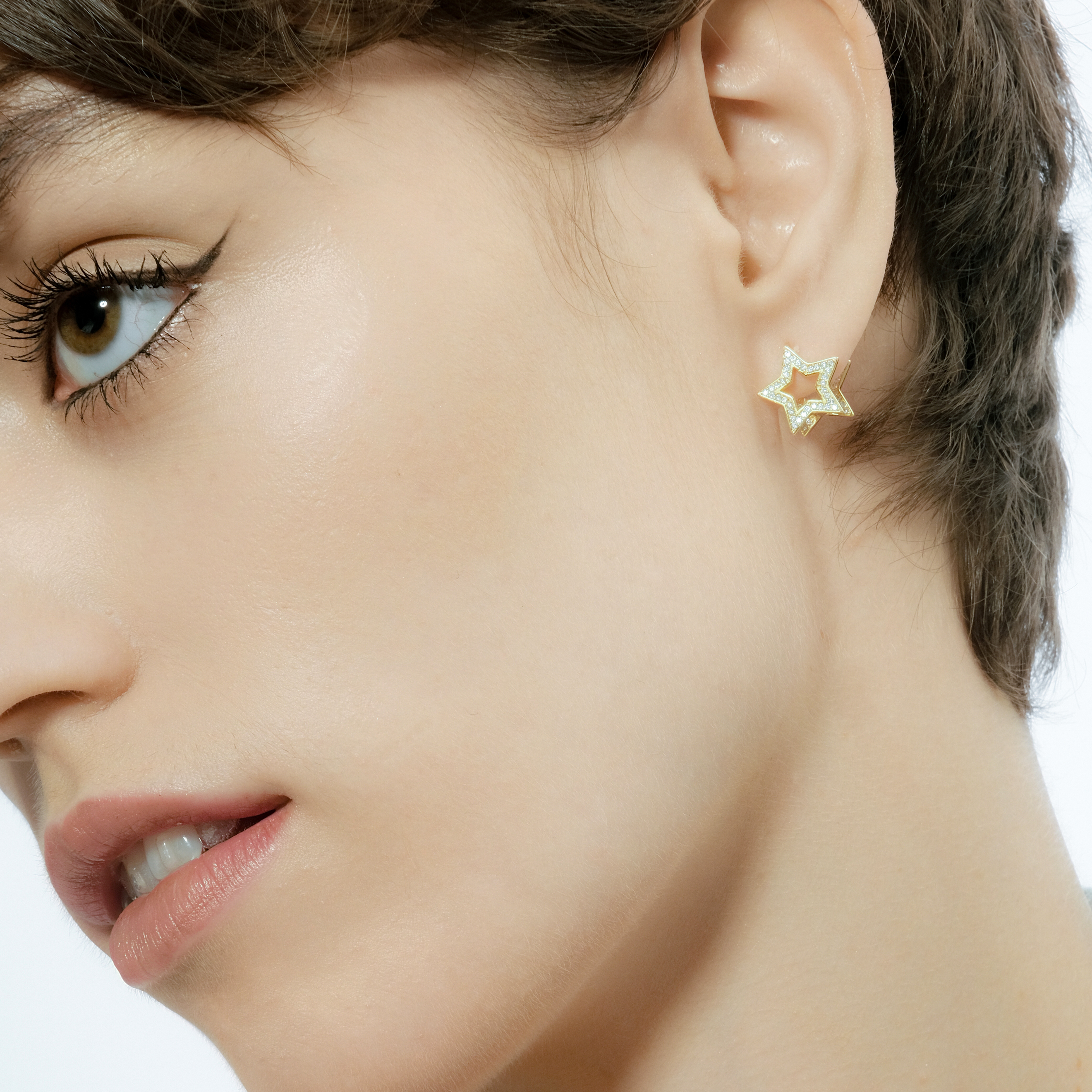 Gold plated store star earrings