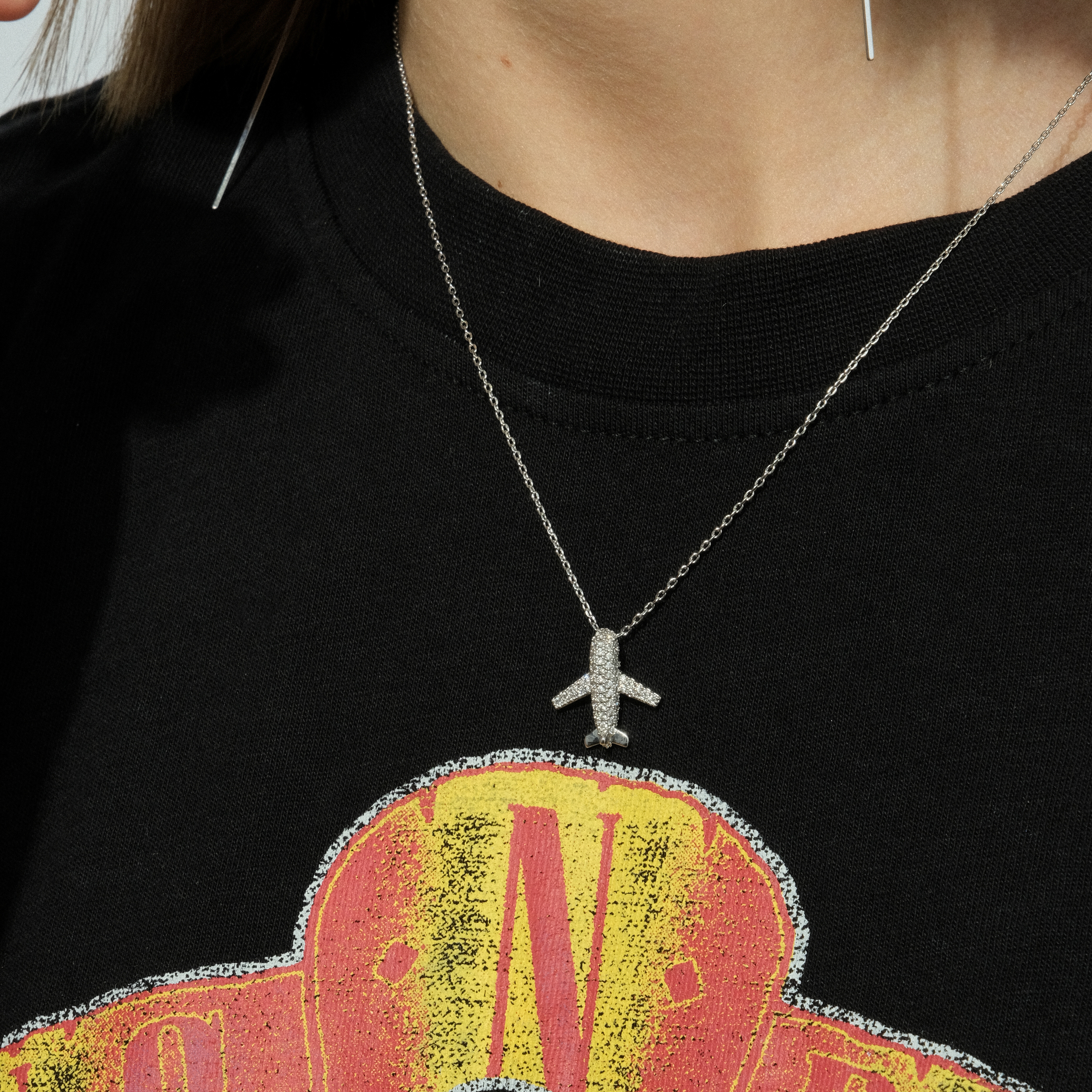 necklace with an airplane pendant – buy at Poison Drop online